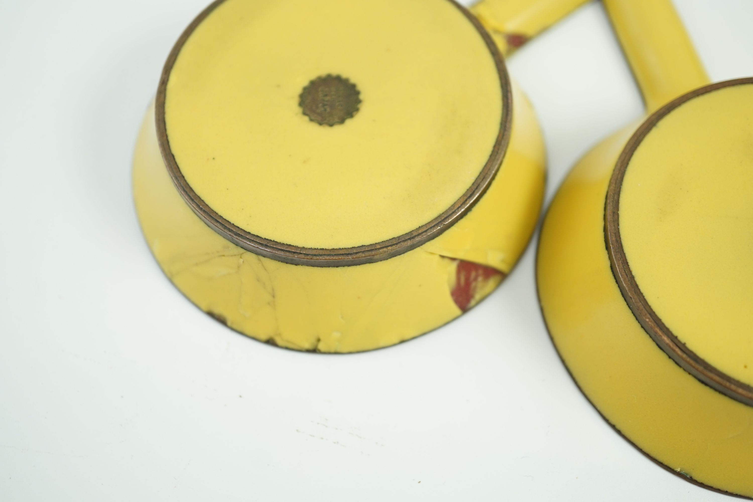 A Japanese cloisonné enamel desk set, 1920s, mounted with two Chinese Qing dynasty pale celadon jade plaques, retailed by Yamanaka & Co., Inkstand 31cm wide